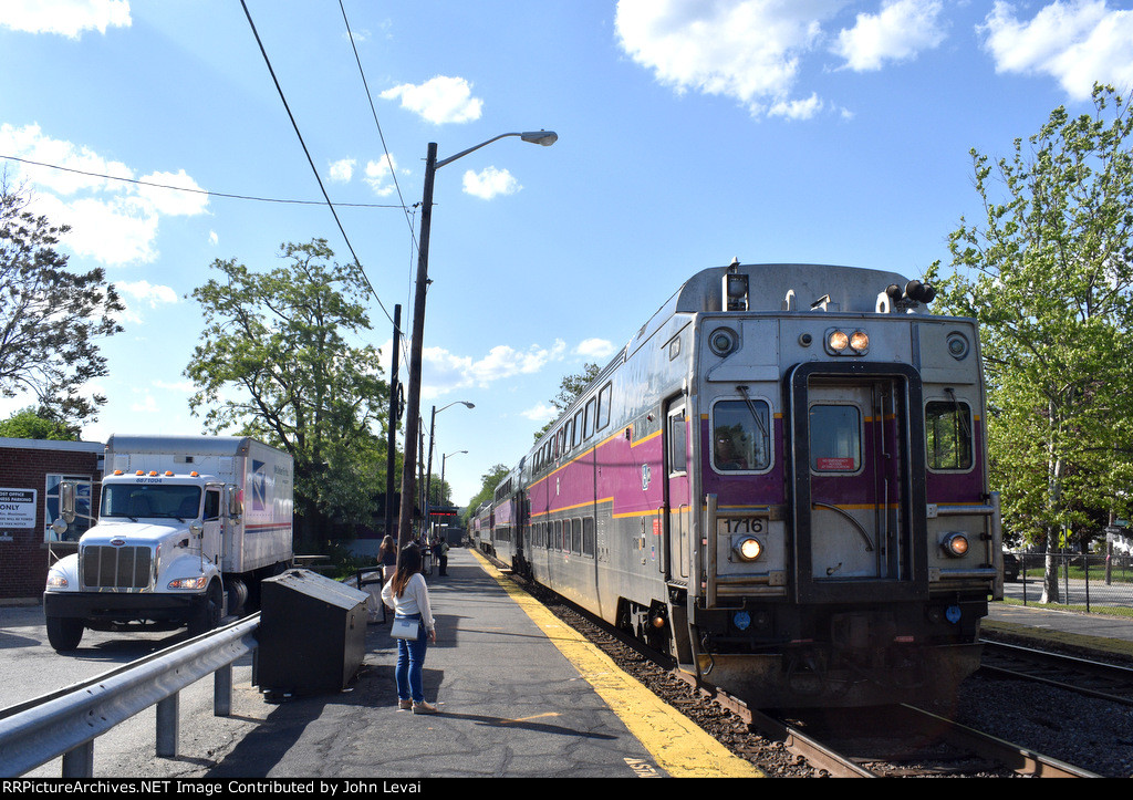 MBTA Train # 328 arriving into W. Medford Station with Kawasaki Bilevel Cab Car # 1716 